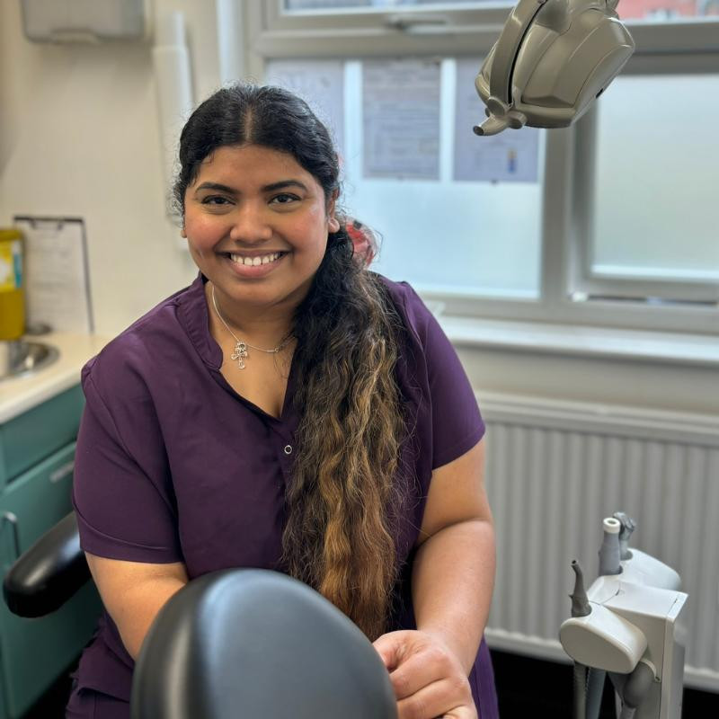 International Dental Graduate, Natasha D'Costa, sat in a dental surgery